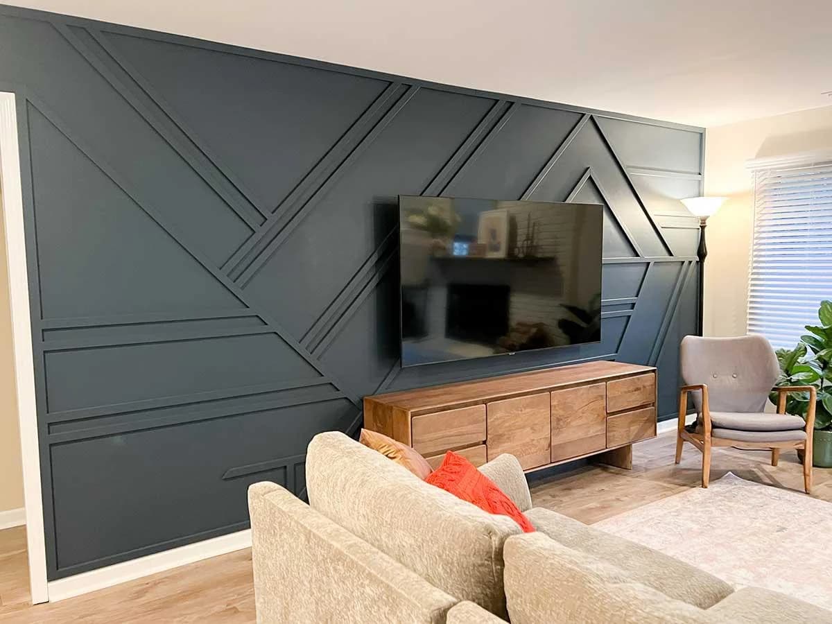 Charcoal Geometric Media Wall design direction