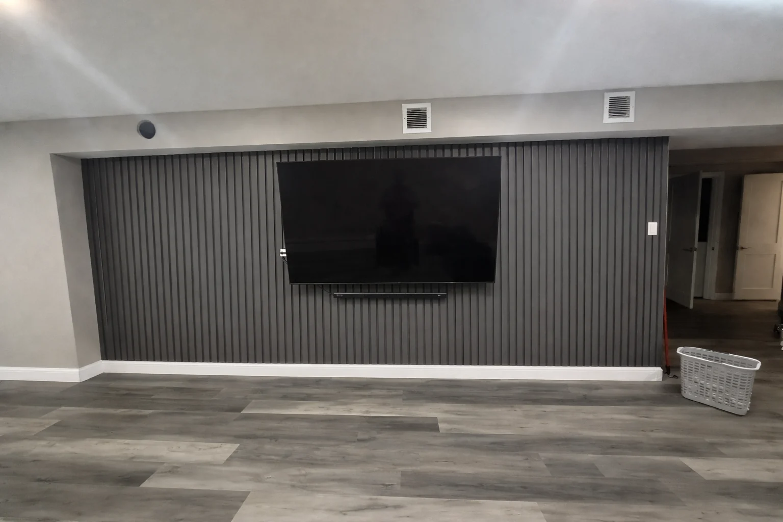 Graphite Full-Width TV Wall design direction
