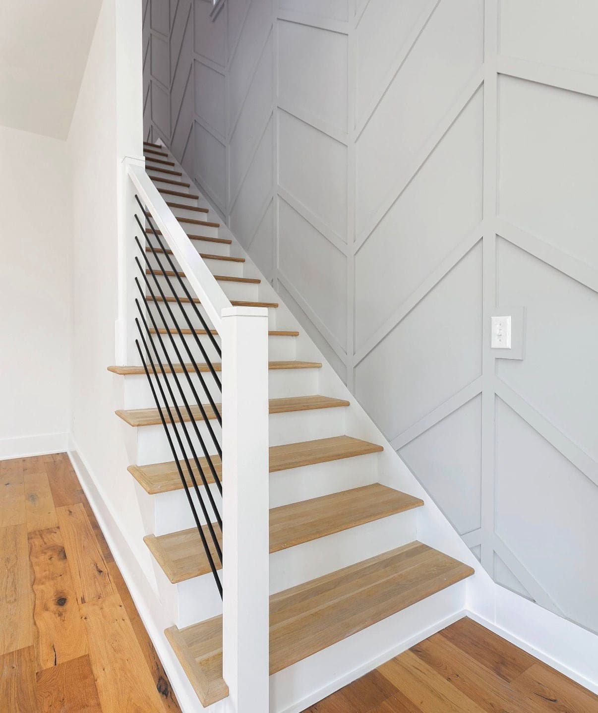 Double-Height Stair Panel Wall design direction